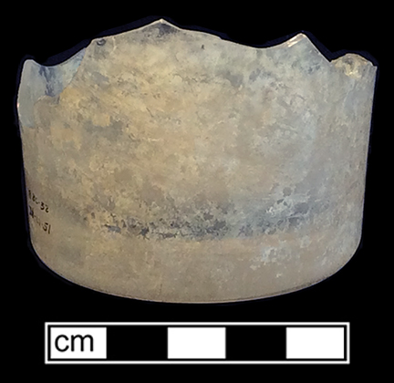 Colorless leaded glass probable tumbler.  Roughly finished glass tipped pontil. 2.5” base diameter. Lot 17. 18BC32
